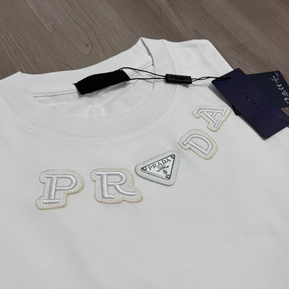 Camiseta OVERSIZE PRADA BORDADA
