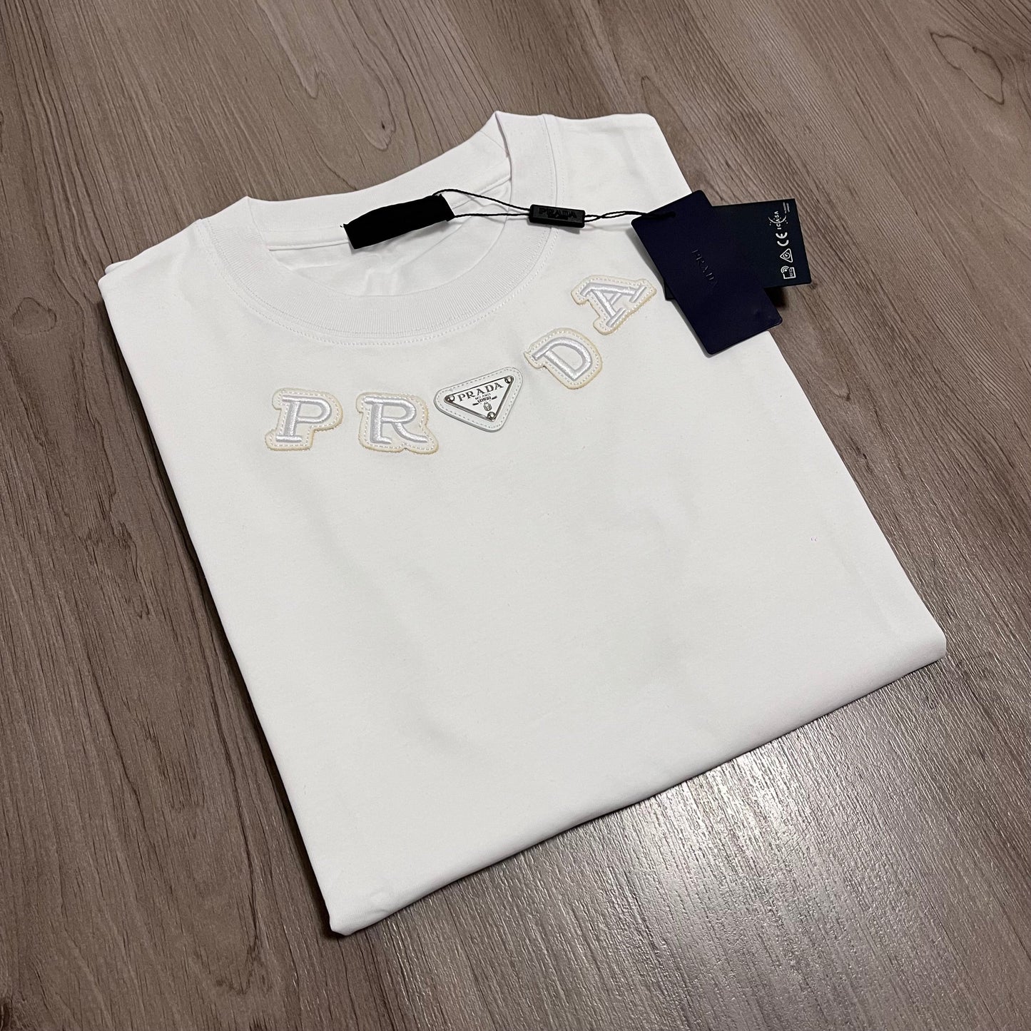 Camiseta OVERSIZE PRADA BORDADA